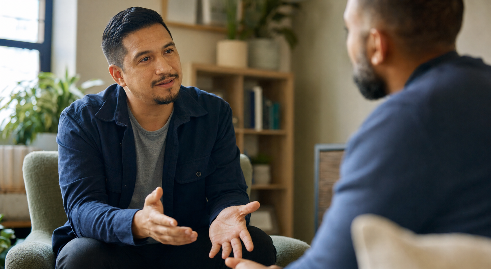 An adult taking part in a supportive recovery conversation